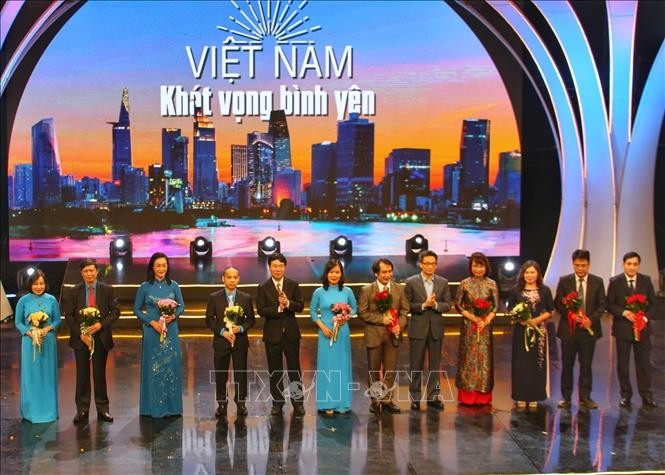 Программа «Вьетнам – стремление к покою», посвященная людям, сражающимся с эпидемией - ảnh 1