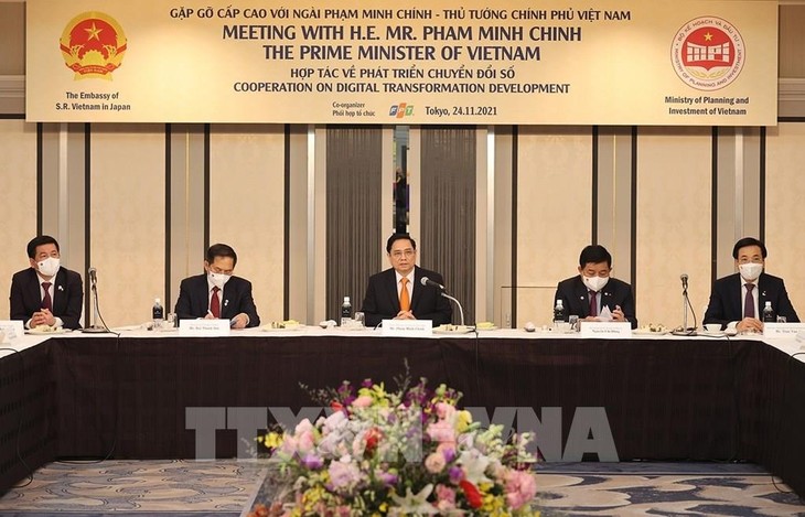 Премьер-министр Фам Минь Чинь: Вьетнам имеет множество преимуществ в развитии экономики и цифровой трансформации - ảnh 1