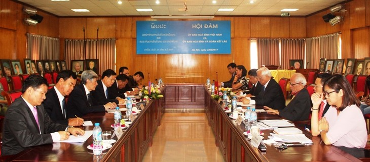 Tăng cường hợp tác giữa Ủy ban Hòa bình Việt Nam và Ủy ban Hòa bình và Đoàn kết Lào - ảnh 1