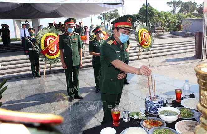 Quảng Trị truy điệu và an táng những hài cốt liệt sĩ Việt Nam hy sinh tại Lào - ảnh 1