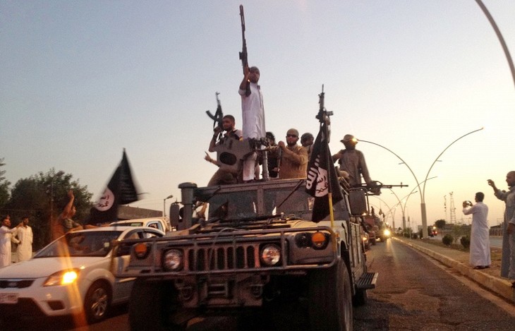 Боевики ИГ казнили ещё десятки человек в Ираке  - ảnh 1