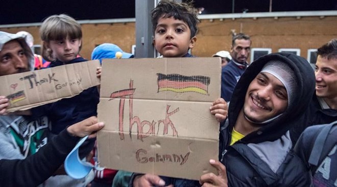 Германия увеличит помощь беженцам в 2016 году - ảnh 1