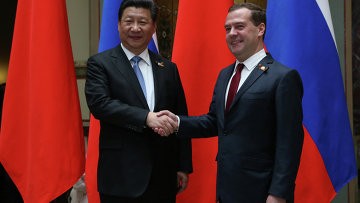 Председатель КНР Си Цзиньпин провёл переговоры с премьер-министром РФ - ảnh 1