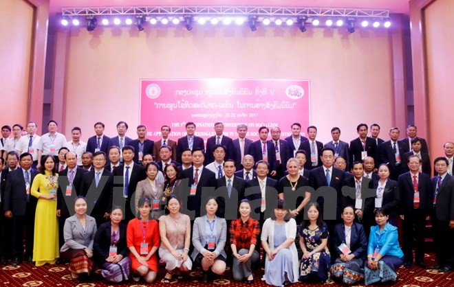 Вьетнам принял участие в международном семинаре в Лаосе, посвященном социализму  - ảnh 1