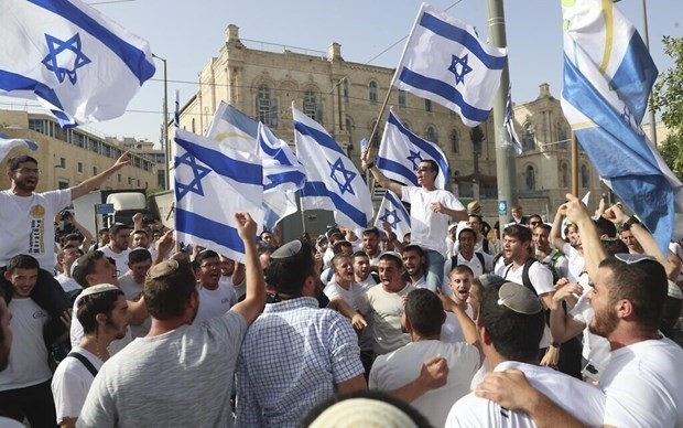 Кабмин Израиля разрешил провести Марш с флагами в Восточном Иерусалиме  - ảnh 1