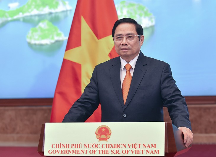 Премьер-министр Фам Минь Чинь: Вьетнам готов вместе с Китаем и другими странами содействовать торговле услугами и развитию цифровой экономики  - ảnh 1
