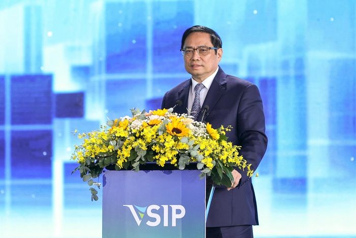 Премьер-министр Фам Минь Тинь принял участие в церемонии закладки фундамента промзоны VSIP3 в провинции Биньзыонг.  - ảnh 1
