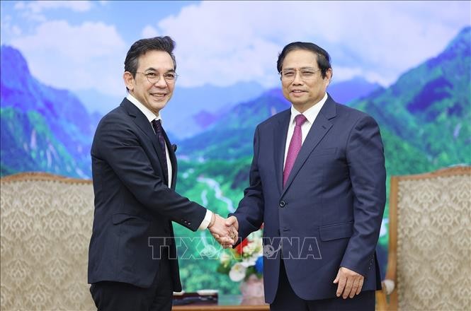 Премьер-министр Фам Минь Тинь принял министра экономического развития и международной торговли Канады и посла Таиланда  - ảnh 2