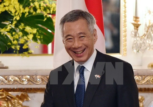 新加坡总理李显龙和夫人正式访问越南 - ảnh 1