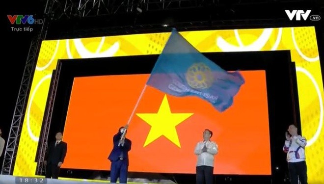 越南接过第31届东南亚运动会会旗 - ảnh 1