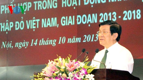 Chủ tịch nước Trương Tấn Sang dự lễ ký kết phối hợp công tác nhân đạo - ảnh 1