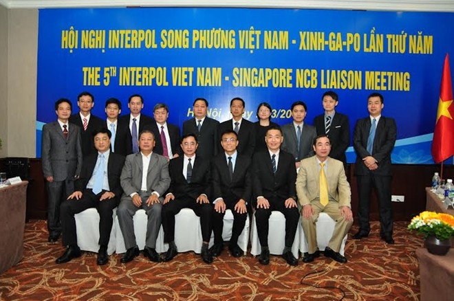 Đẩy mạnh hợp tác đấu tranh chống tội phạm giữa Interpol Việt Nam và Singapore - ảnh 1