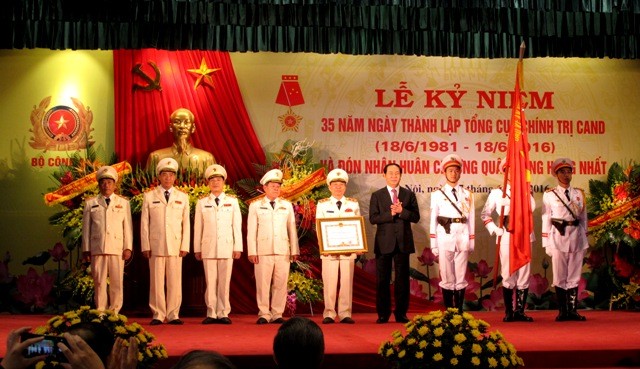 Chủ tịch nước Trần Đại Quang dự lễ kỷ niệm 35 năm Ngày thành lập Tổng cục Chính trị Công an nhân dân - ảnh 1