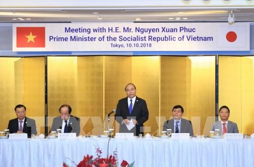Thủ tướng Nguyễn Xuân Phúc tọa đàm với doanh nghiệp Nhật Bản, tiếp Chủ tịch Ngân hàng MUFJ, Chủ tịch Công ty Mitsubishi và Chủ tịch JETRO - ảnh 1
