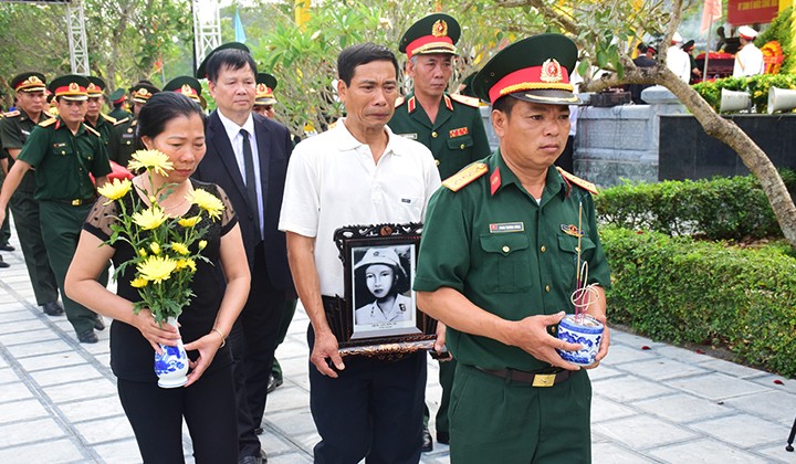 Tổ chức truy điệu, an táng hài cốt liệt sĩ quân tình nguyện và chuyên gia Việt Nam hy sinh tại Lào - ảnh 1