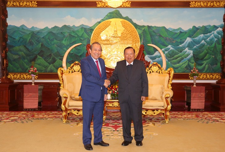 Phó Thủ tướng thường trực Trương Hòa Bình chào xã giao Tổng Bí thư – Chủ tịch nước và Thủ tướng Lào - ảnh 1
