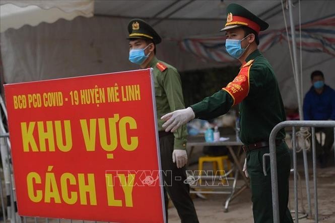 Báo Pháp giải thích nguyên nhân Việt Nam hạn chế thành công sự lây lan của đại dịch COVID-19 - ảnh 1