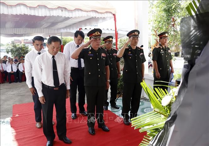 Tiếp nhận và hồi hương 96 hài cốt liệt sĩ Việt Nam hy sinh tại Lào  - ảnh 1