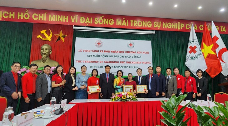 Lễ trao Huân chương hữu nghị của Chính phủ nước CHDCND Lào - ảnh 1