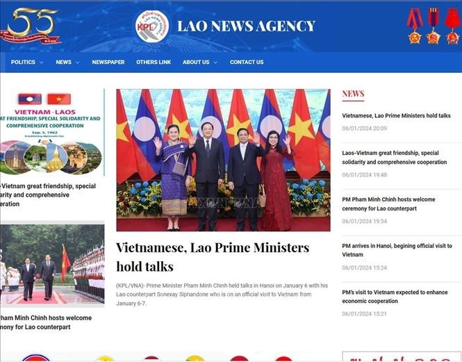Báo chí Lào đưa tin đậm nét về quan hệ đặc biệt Việt - Lào  - ảnh 1