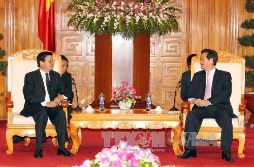 Руководители Вьетнама приняли делегацию Отдела по внешним делам НРПЛ - ảnh 2
