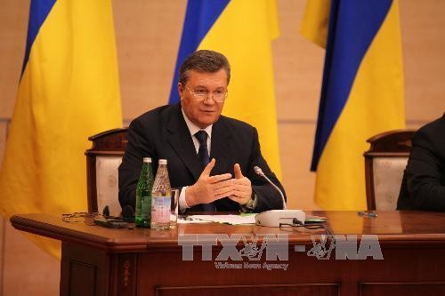 ประธานาธิบดียูเครน ยานูโกวิชประกาศจะต่อสู้เพื่อแก้ไขวิกฤตในประเทศ - ảnh 1