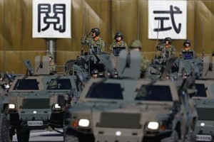 พรรคร่วมรัฐบาลญี่ปุ่นอนุมัติกฎระเบียบใหม่เกี่ยวกับการส่งออกอาวุธ - ảnh 1
