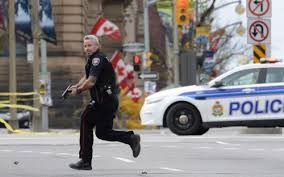 คนร้ายที่ก่อเหตุยิงปืนที่อาคารรัฐสภาแคนาดาถูกสังหาร - ảnh 1