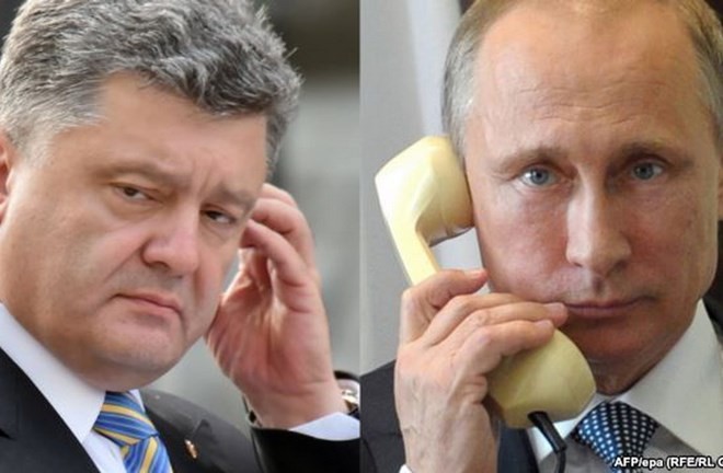 ผู้นำรัสเซียและยูเครนเจรจาผ่านทางโทรศัพท์ - ảnh 1