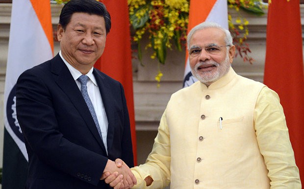 ประธานประเทศจีนพบปะกับนายกรัฐมนตรีอินเดีย - ảnh 1