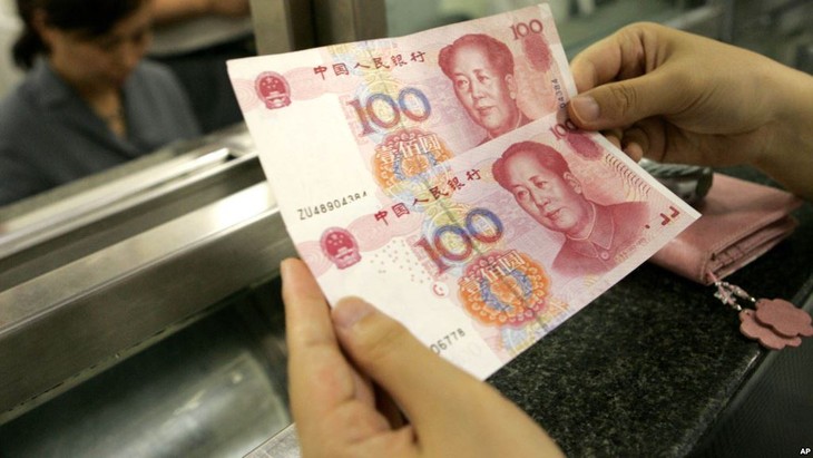 จีนปรับเพิ่มค่าเงินหยวนครั้งใหญ่ที่สุดในรอบ๑๐ปี - ảnh 1