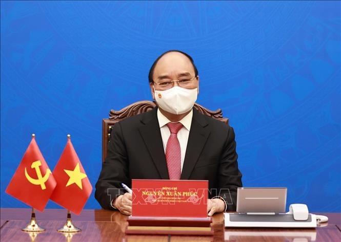 ประธานประเทศ เหงวียนซวนฟุกพูดคุยผ่านทางโทรศัพท์กับเลขาธิการใหญ่พรรค ประธานประเทศจีน สีจิ้นผิง - ảnh 1