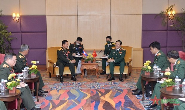 เสนาธิการใหญ่กองทัพประชาชนเวียดนามพบปะกับบรรดาผู้บริหารกองทัพลาวและเมียนมาร์ - ảnh 1