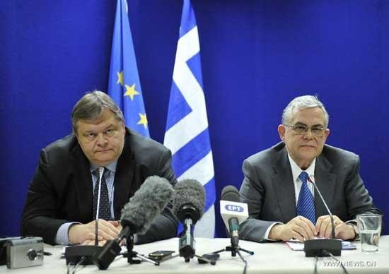 Eurozone approves a second bailout for Greece - ảnh 1