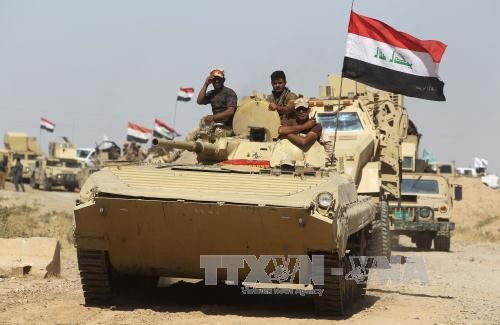 Iraqi forces attack last IS stronghold - ảnh 1