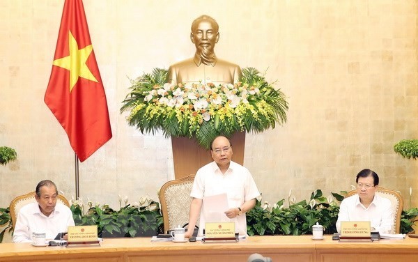 PM Nguyen Xuan Phuc asks for greater focus on building institutions - ảnh 1