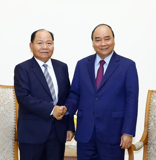 Prime Minister hosts Lao Minister of Home Affairs - ảnh 1