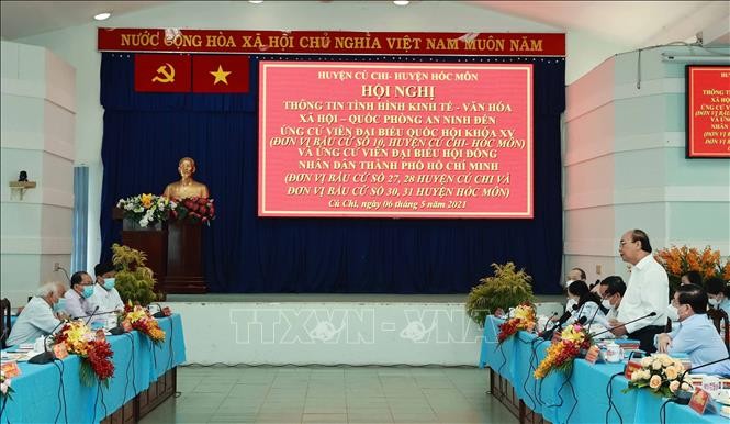 President Nguyen Xuan Phuc works with Cu Chi, Hoc Mon district authorities - ảnh 1