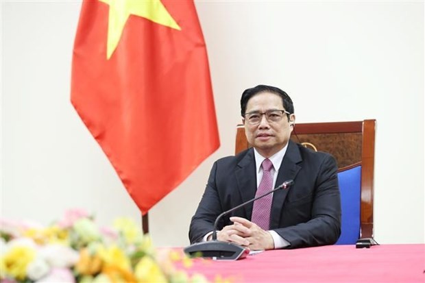 Prime Minister holds phone talks with COVAX Managing Director - ảnh 1