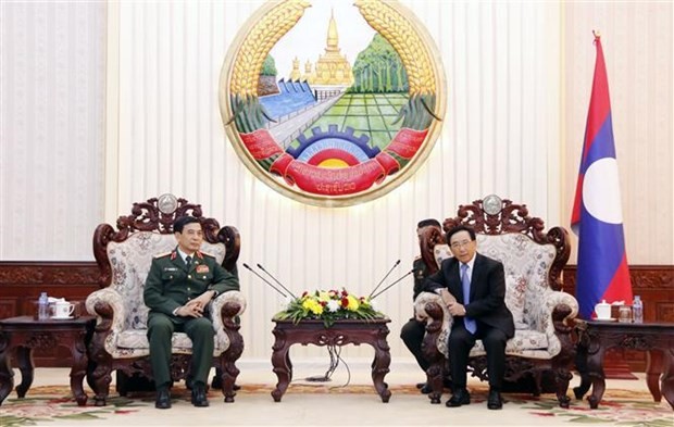 Lao leaders welcome visiting defense minister of Vietnam - ảnh 2