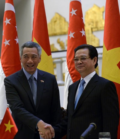 Prosiguen actividades del Premier singapurense en visita oficial a Vietnam  - ảnh 1