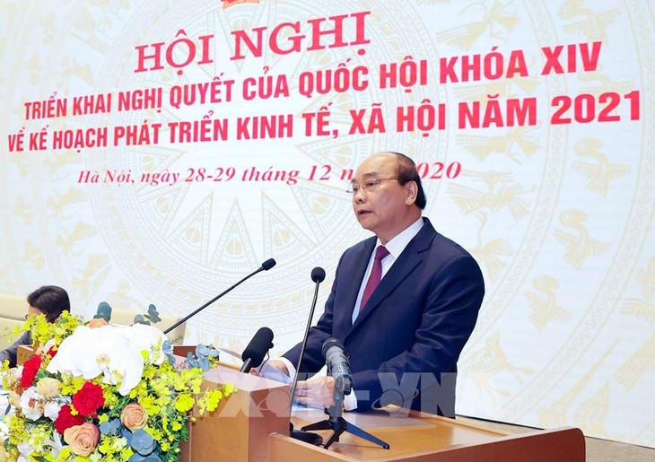 El Gobierno de Vietnam aborda tareas de 2021 en teleconferencia con las localidades - ảnh 1