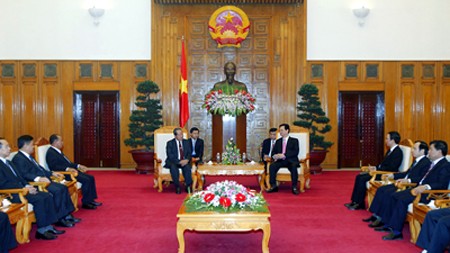 นายกรัฐมนตรีNguyễn Tấn Dũngให้การต้อนรับคณะผู้แทนระดับสูงของลาว - ảnh 1
