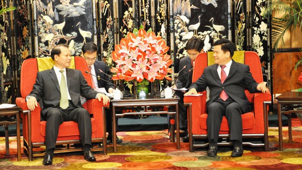 ท่าน Vũ Văn Ninh รองนายกรัฐมนตรีให้การต้อนรับผู้ว่าราชการมณฑลยูนนาน ประเทศจีน - ảnh 1
