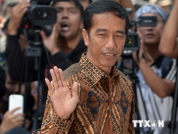 ประธานาธิบดีอินโดนีเซียคนใหม่ทำการสำรวจประชามติเกี่ยวกับคณะรัฐมนตรีชุดใหม่ - ảnh 1