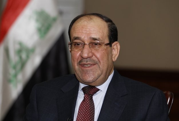 นายกรัฐมนตรีอิรัก นูรี อัลมาลีกี ลาออกจากตำแหน่ง - ảnh 1