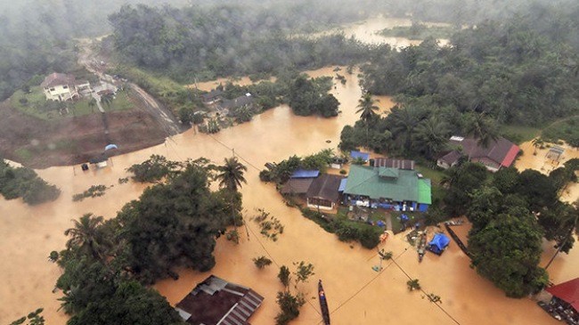 ผู้นำเวียดนามส่งโทรเลขถึงผู้นำมาเลเซียเกี่ยวกับเหตุน้ำท่วมที่เลวร้ายที่สุดในประวัติศาสตร์ - ảnh 1