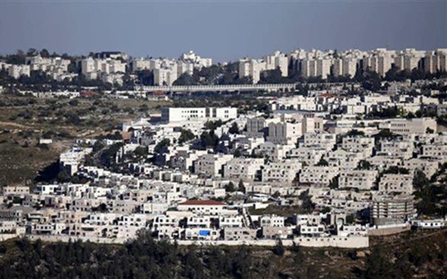 สหประชาชาติอนุมัติมติที่เรียกร้องให้อิสราเอลยุติการก่อสร้างเขตตั้งถิ่นฐาน - ảnh 1