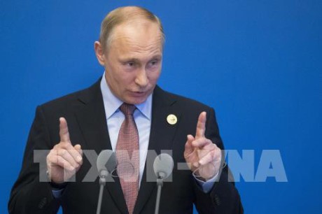 ประธานาธิบดีปูตินปฏิเสธการที่รัสเซียรับข้อมูลลับจากประธานาธิบดีสหรัฐ - ảnh 1