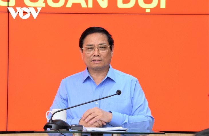 นายกรัฐมนตรี ฝ่ามมิงชิ้ง กำชับว่า กลุ่มบริษัท Viettel ต้องเป็นรูปแบบดีเด่นของสถานประกอบการภาครัฐ - ảnh 1
